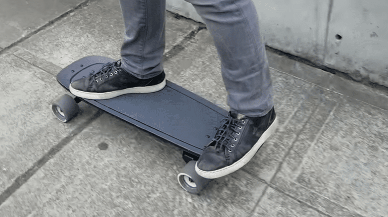 Boy using Boosted Mini X Electric Skateboard