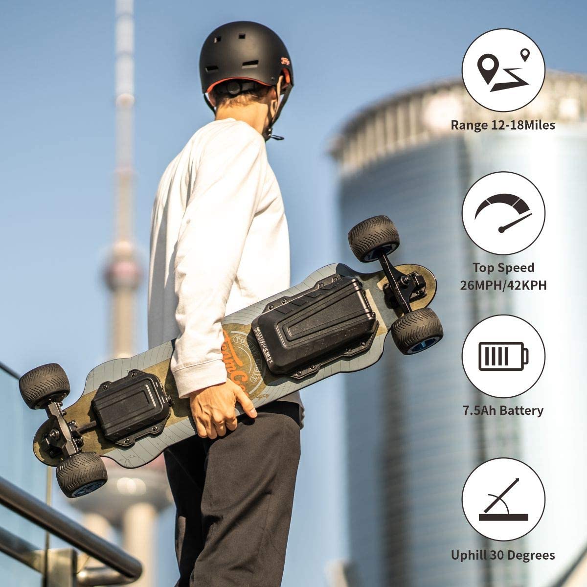 man carrying Teamgee H20T 39 Electric Skateboard