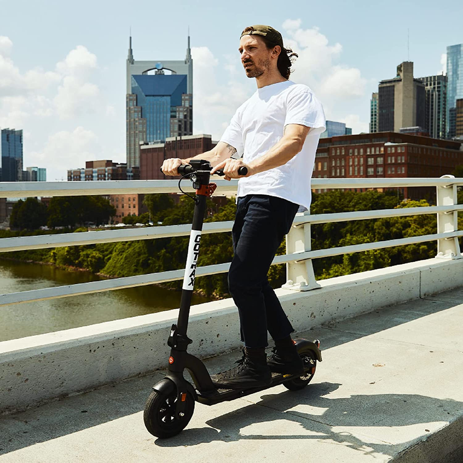 man riding GoTrax G4 Electric Scooter