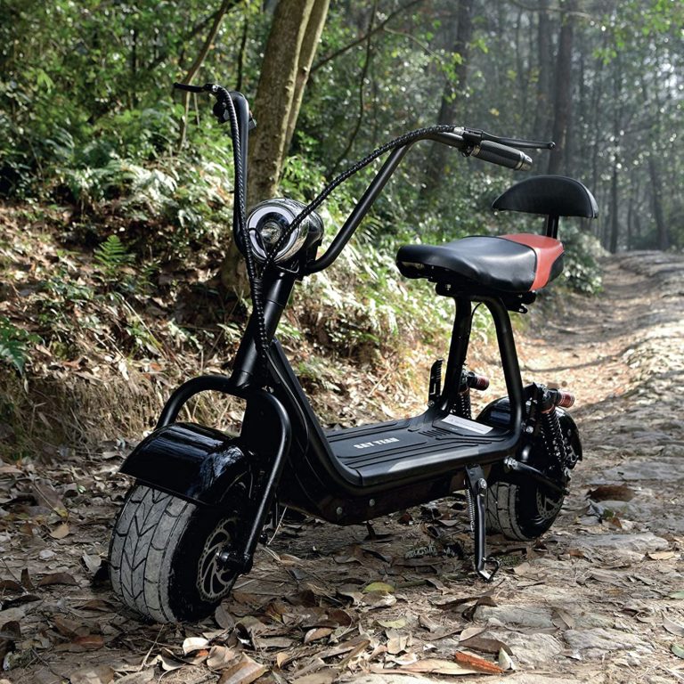 TOXOZERS Fat Tire Scooter parked on a rough road