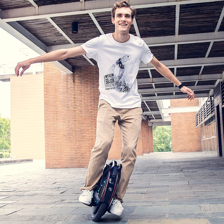 man riding an electric unicycle