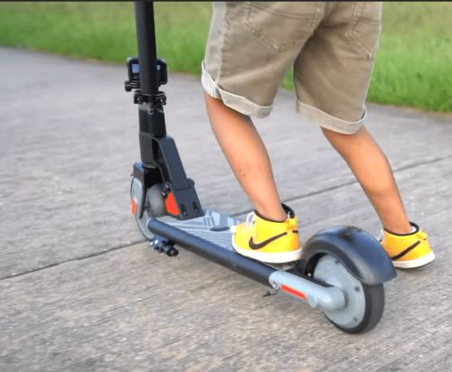 Kid riding Gotrax GKS Electric Scooter