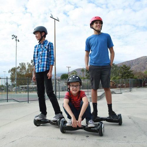 Kids using the Swagtron T5