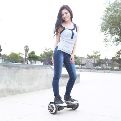 girl riding a Swagtron T5