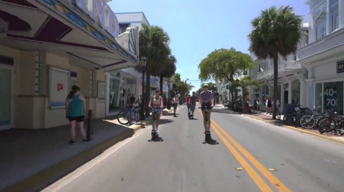 ladies riding scooters in Key West