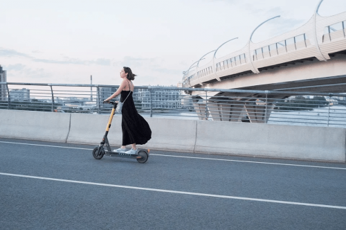 lady riding an electric scooter